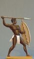 A picture of an African warrior throwing a spear